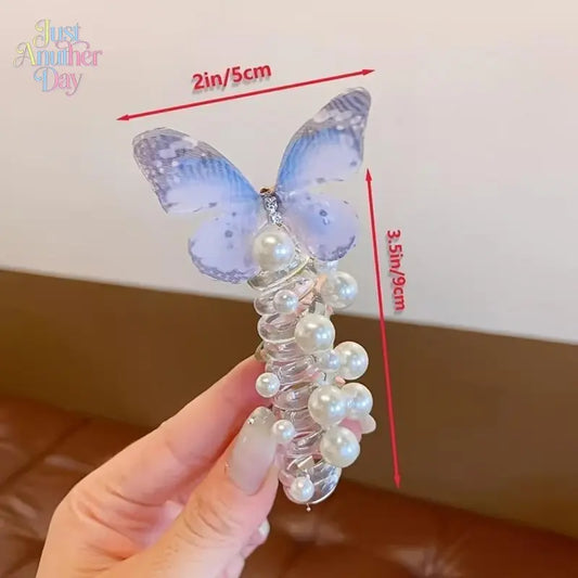 This set of three exquisite mesh butterfly-shaped telephone cord hair ties is perfect for girls. Featuring a cute beaded flower design, these sweet hair accessories are suitable for everyday wear and parties.