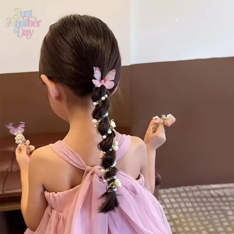 This set of three exquisite mesh butterfly-shaped telephone cord hair ties is perfect for girls. Featuring a cute beaded flower design, these sweet hair accessories are suitable for everyday wear and parties.
